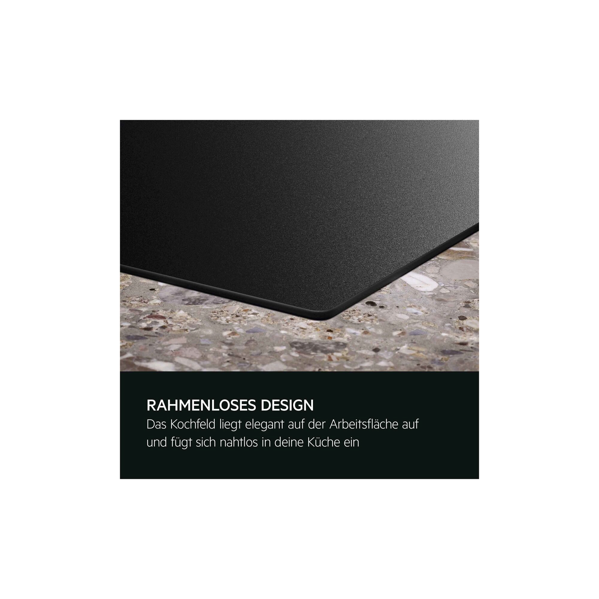 Nahaufnahme einer schwarzen, rahmenlosen Kochfeldecke auf einer hellen Stein-Arbeitsplatte.