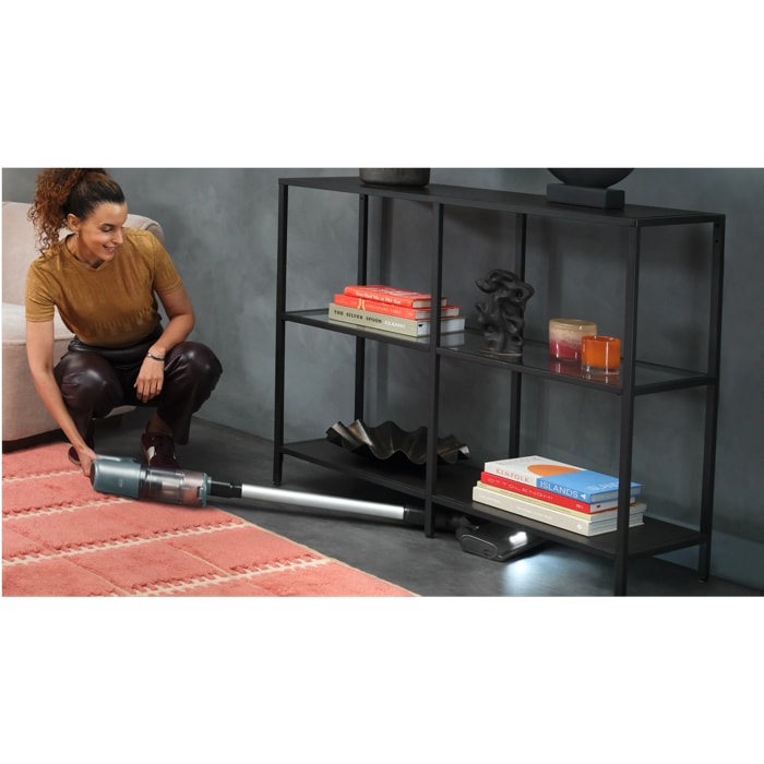 Cordless cleaner designed for easy cleaning under furniture.