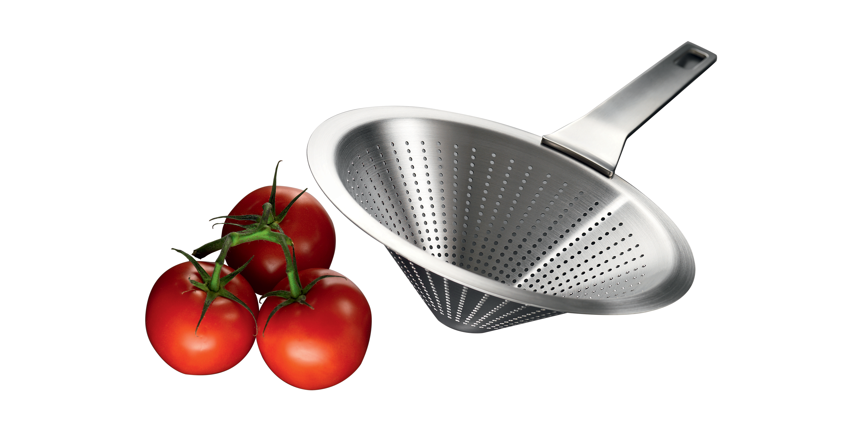 Ein Spitzsieb der The Mastery Kollektion und Strauchtomaten
